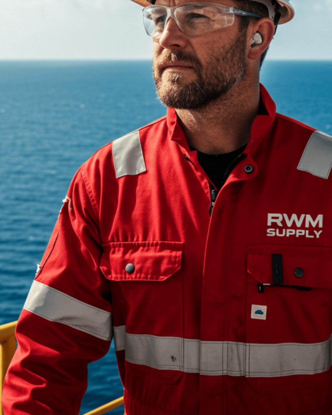 Offshore worker wearing RWM Supply flame-resistant PPE on oil platform